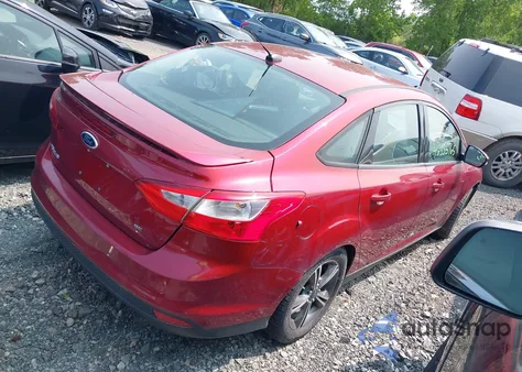 2014 Ford Focus Se z USA, uszkodzony, nr VIN 1FADP3F21EL459119